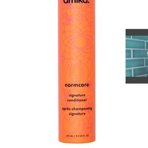 Amika Normcore Conditioner in Bright Orange